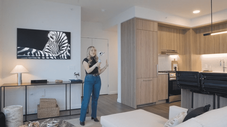woman leasing agent recording apartment tour using realync virtual leasing software