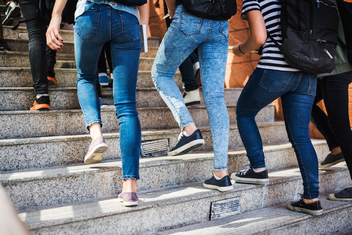Students walking up on staircase
