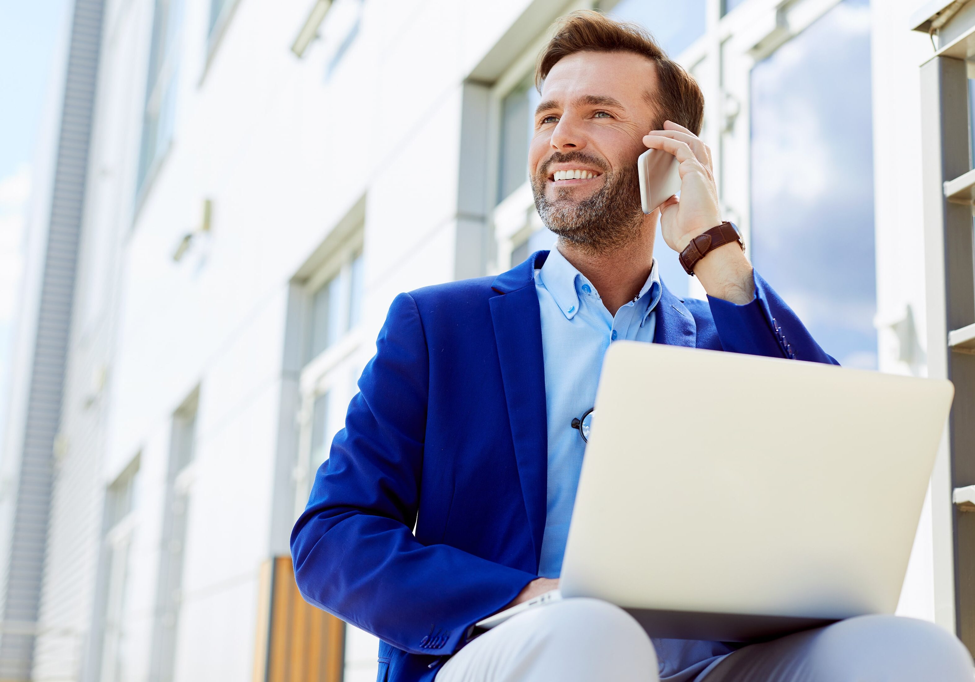 Handsome middle-aged business executive talking on phone smiling and working on laptop while sitting on top of staircase outside
business, businessman, man, laptop, phone, talking, sitting, using, outdoors, stairs, cheerful, working, people, city, computer, male, call, cellphone, one person, smartphone, device, entrepreneur, handsome, smiling, leader, executive, internet, caucasian, success, daylight, lifestyle, occupation, outside, successful, professional, urban, 40s, middle aged, street, corporate, technology, wireless, style, network, adult, busy, stylish, manager, wifi, attractive