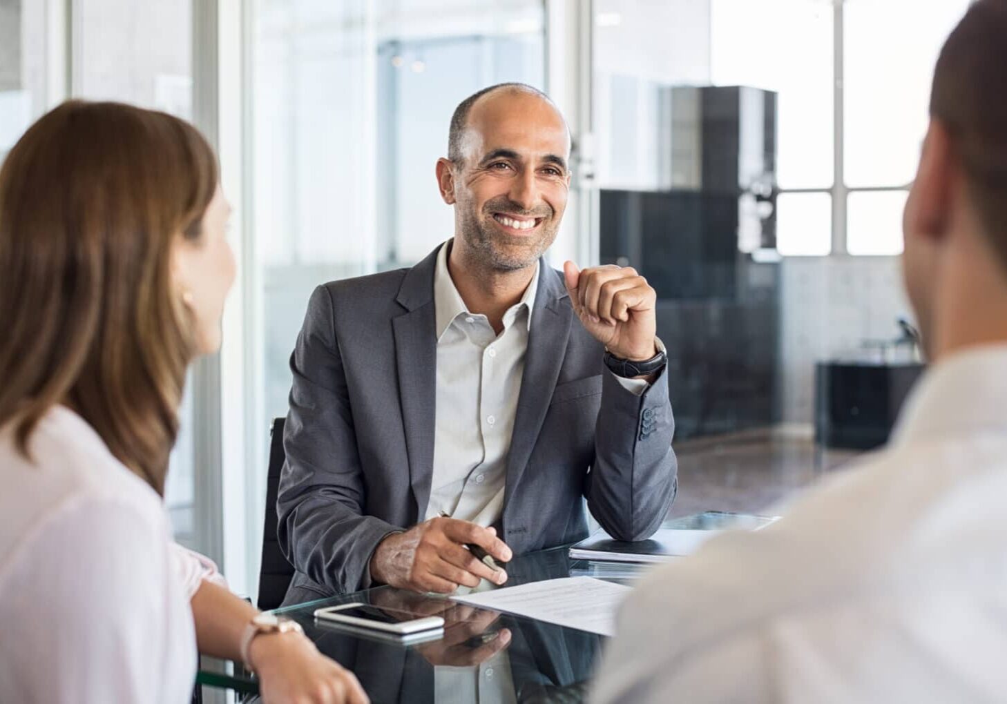 Happy financial agent smiling
