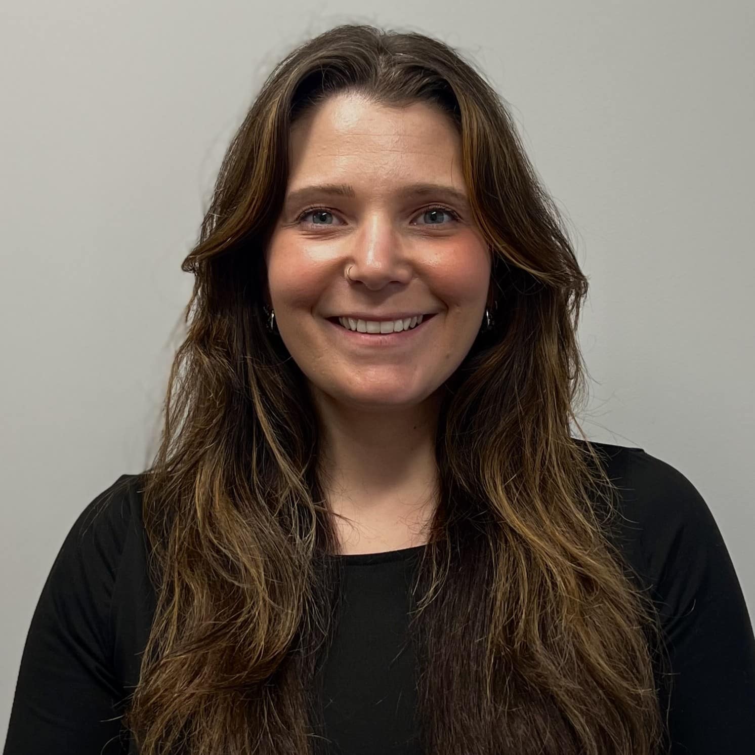 sara woods, director of brand, marketing, and customer experience at HILLS properties headshot